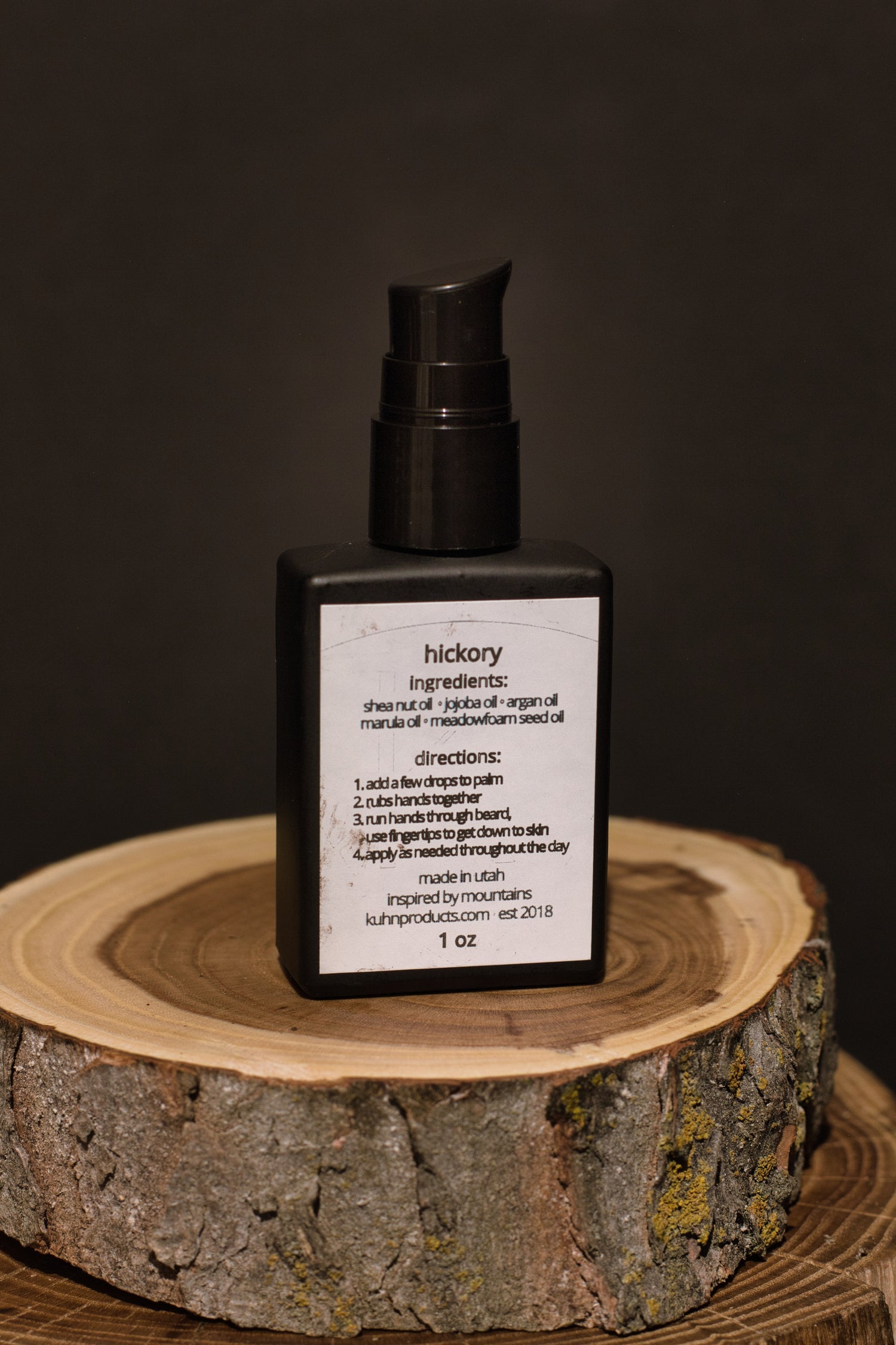 A 1 oz bottle of hickory beard oil by kühn products.