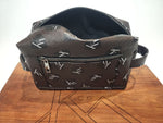 Load image into Gallery viewer, Toiletry bag dopp kit from kühn products dark brown with black kühn logo top view.
