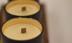 Load image into Gallery viewer, 8 oz beeswax candle from kuhn products with a cherry wood wick in hickory scent
