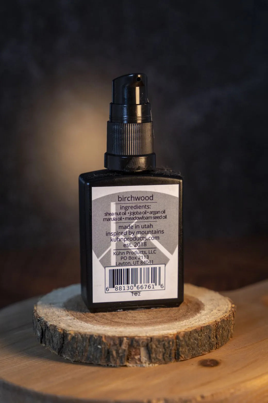 A 1 oz bottle of birchwood beard oil by kühn products.