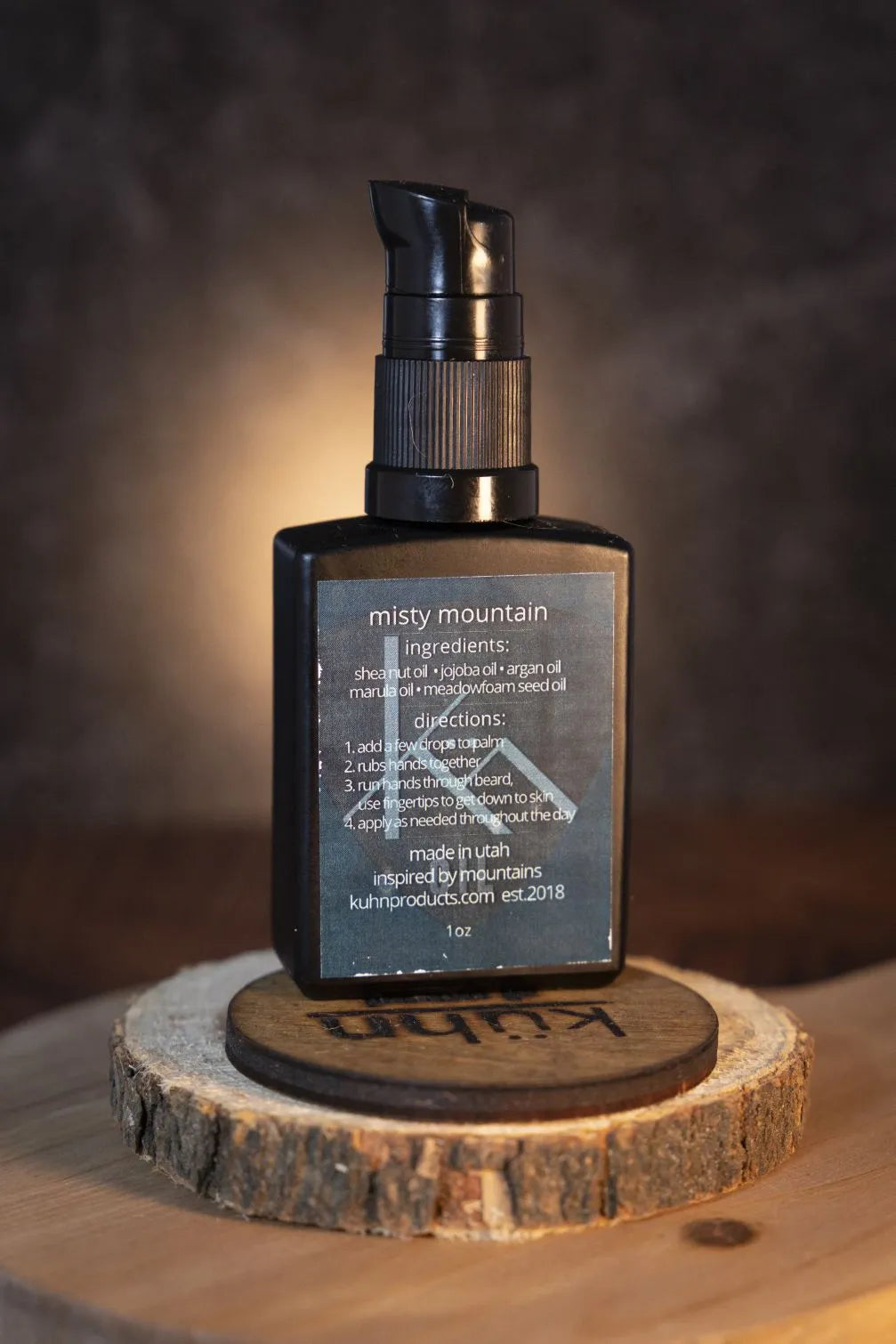 A 1 oz bottle of misty mountain beard oil by kühn products.