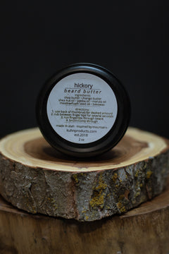 A 2oz tin of hickory beard butter by kühn products.