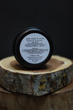 A 2oz tin of palo santo & musk beard butter by kühn products.