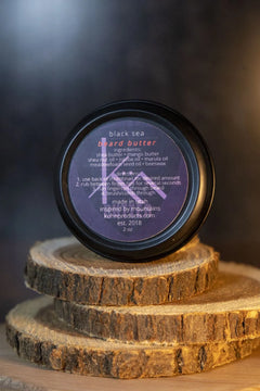 A 2oz tin of black sea beard butter by kühn products.