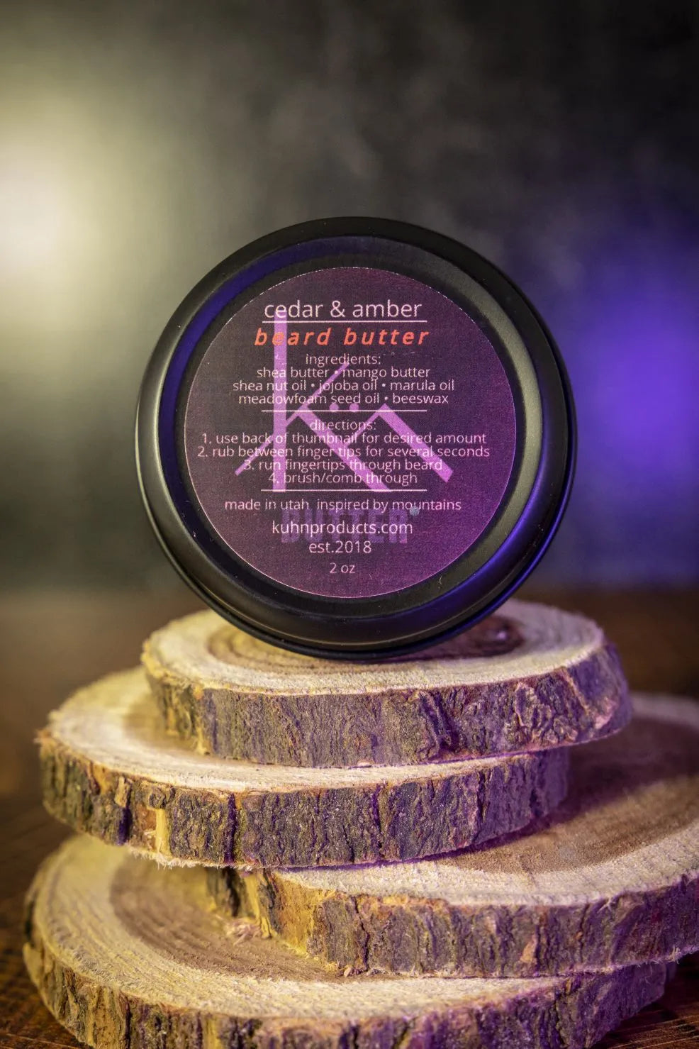 A 2oz tin of cedar & amber beard butter by kühn products.