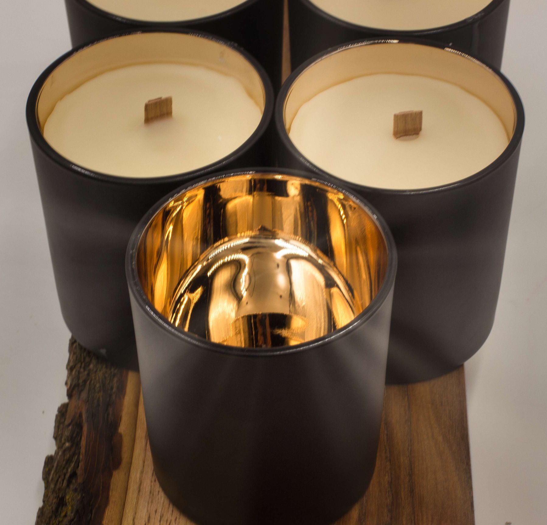 Our matte black tumbler has a gold plated reflective interior.